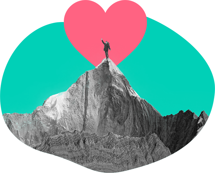 Person standing on a mountain with a heart rising like the sun.