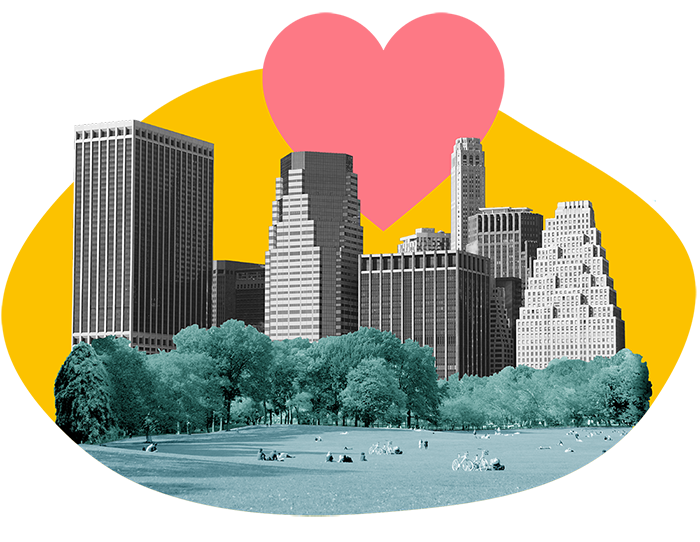 Heart-shaped sun rising over a park with people.